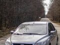 2011 Ford Focus II Рестайлинг, серебристый, 570000 рублей - вид 2