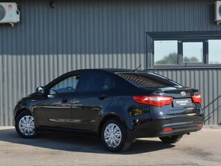 2012 Kia Rio 5-speed III, чёрный, 669888 рублей, вид 4