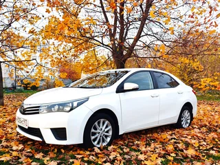 2013 Toyota Corolla XI (E160, E170, E180), белый, 1360000 рублей, вид 1