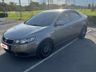 2010 Kia Cerato 6-speed II, серый, 750000 рублей, вид 1