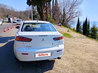 2012 Mitsubishi Lancer X Рестайлинг, белый, 680000 рублей, вид 2