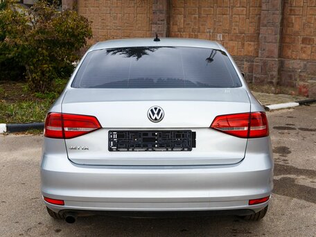 2015 Volkswagen Jetta VI Рестайлинг, серебристый, 1100000 рублей, вид 5