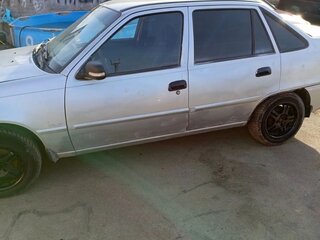 2012 Daewoo Nexia I Рестайлинг, серебристый, 149000 рублей, вид 3