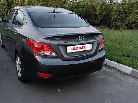 2013 Hyundai Solaris I, чёрный, 730000 рублей, вид 2