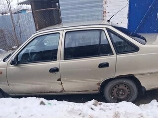 2011 Daewoo Nexia I Рестайлинг, золотистый, 180000 рублей, вид 2