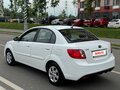 2011 Kia Rio II Рестайлинг, белый - вид 3