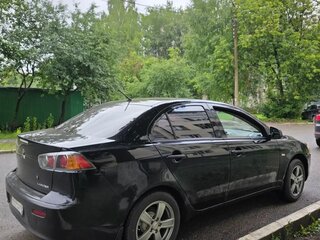 2010 Mitsubishi Lancer X, чёрный, 750000 рублей, вид 2