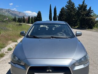 2012 Mitsubishi Lancer X Рестайлинг, серый, 900000 рублей, вид 3
