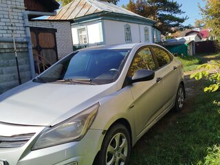 2015 Hyundai Solaris I Рестайлинг, серебристый, 620000 рублей, вид 2