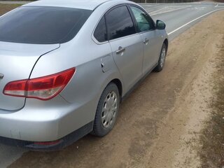 2014 Nissan Almera III (G15), серебристый, 450000 рублей, вид 2