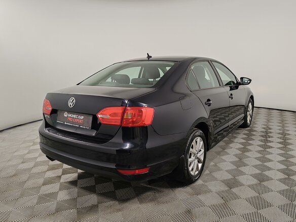 2012 Volkswagen Jetta VI, чёрный, 820000 рублей - вид 4