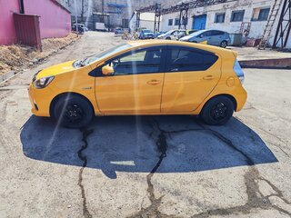 2012 Toyota Aqua I, жёлтый, 670000 рублей, вид 4