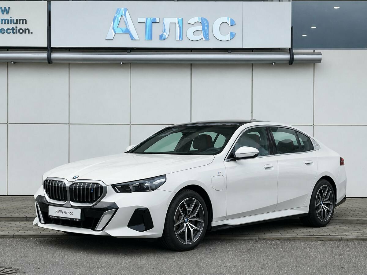 Открыть фотографии: BMW i5