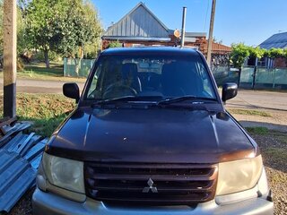 1999 Mitsubishi Pajero iO, коричневый, 390000 рублей, вид 2