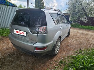 2010 Mitsubishi Outlander II Рестайлинг, серебристый, 1400000 рублей, вид 2