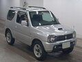 2011 Suzuki Jimny Kei car III Рестайлинг 1, серебристый, 1050000 рублей - вид 2