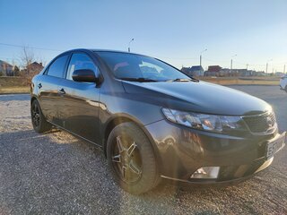 2011 Kia Cerato 6-speed II, коричневый, 850000 рублей, вид 1