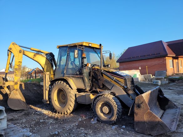2004 Caterpillar 428, золотистый, 2300000 рублей