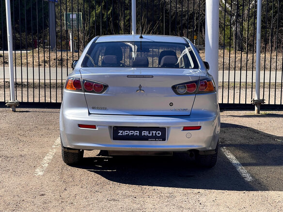 2011 Mitsubishi Lancer X Рестайлинг, серебристый, 629000 рублей - вид 5