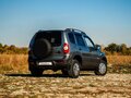 2015 Chevrolet Niva I Рестайлинг, серый, 570000 рублей - вид 1