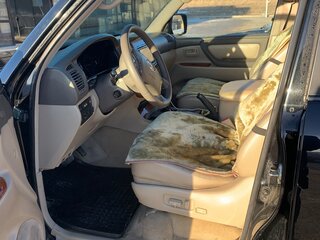 2004 Toyota Land Cruiser 100 Series Рестайлинг 1, чёрный, 2200000 рублей, вид 4