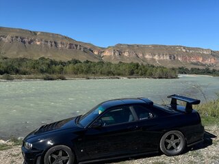 1998 Nissan Skyline X (R34), чёрный, 5500000 рублей, вид 2