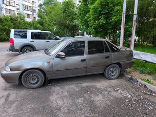 2001 Daewoo Nexia I, золотистый, 70000 рублей, вид 5