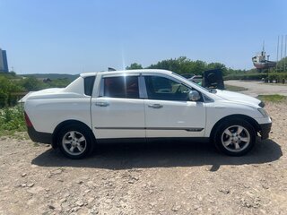 2011 SsangYong Actyon Sports I, белый, 800000 рублей, вид 4