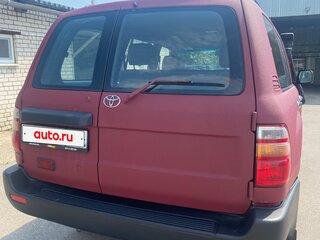 1999 Toyota Land Cruiser 105 100 Series, красный, 1200000 рублей, вид 3