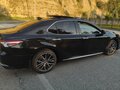 2023 Toyota Camry VIII (XV70) Рестайлинг, чёрный, 2825000 рублей - вид 3