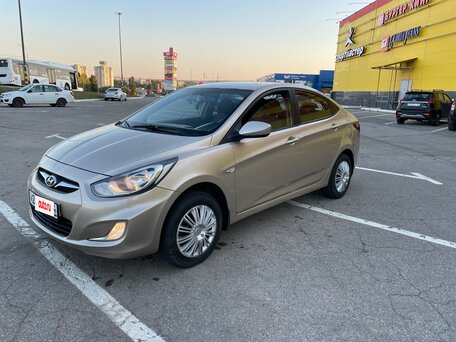 2011 Hyundai Solaris I, золотистый, 590000 рублей, вид 1