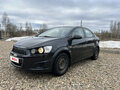 2014 Chevrolet Aveo II, чёрный, 650000 рублей
