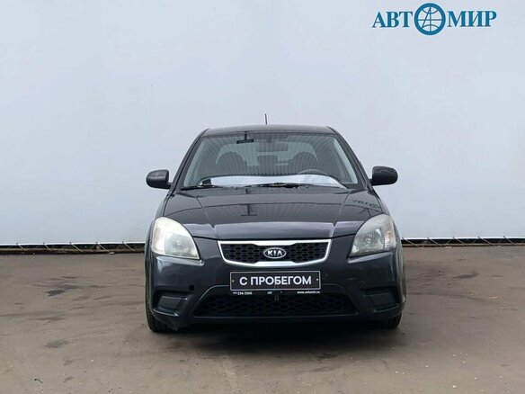2011 Kia Rio II Рестайлинг, чёрный - вид 1