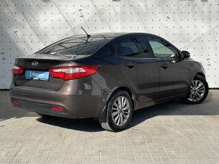 2014 Kia Rio 6-speed III, коричневый, 855000 рублей, вид 5
