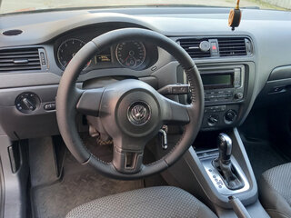 2014 Volkswagen Jetta VI Рестайлинг, коричневый, 980000 рублей, вид 4