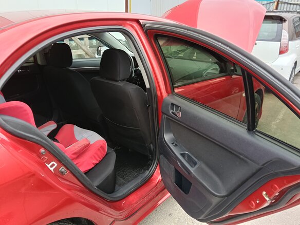2008 Mitsubishi Lancer X, красный, 649000 рублей - вид 16