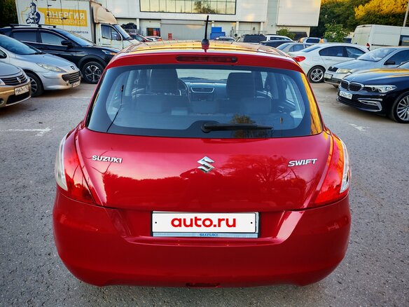 2011 Suzuki Swift IV, красный - вид 4