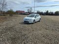 2010 Toyota Auris I Рестайлинг, белый - вид 1