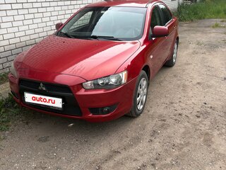 2008 Mitsubishi Lancer X, красный, 750000 рублей, вид 1