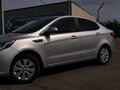 2011 Kia Rio 5-speed III, серебристый, 715000 рублей - вид 3