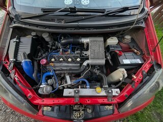 2001 Daihatsu YRV I, красный, 295000 рублей, вид 4