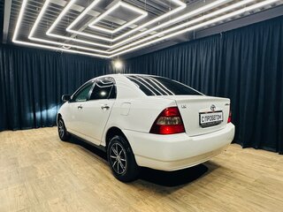 2001 Toyota Corolla IX (E120, E130), белый, 649999 рублей, вид 4