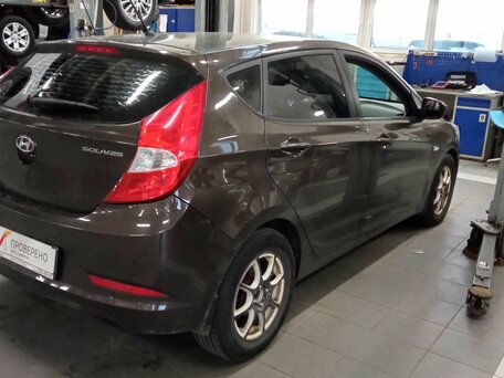 2015 Hyundai Solaris I Рестайлинг, коричневый, 665000 рублей, вид 3