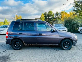 1999 Mazda Demio I (DW), фиолетовый, 199999 рублей, вид 5