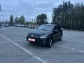 2011 Volkswagen Tiguan I Рестайлинг, чёрный, 1150000 рублей - вид 3