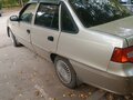 2012 Daewoo Nexia I Рестайлинг, бежевый - вид 7