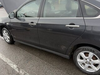 2014 Nissan Almera III (G15), чёрный, 650000 рублей, вид 3
