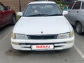 1992 Toyota Corolla VII (E100), белый, 140000 рублей - вид 1