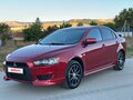 2007 Mitsubishi Lancer X, красный - вид 1