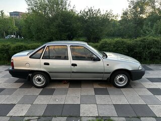 2005 Daewoo Nexia I, серебристый, 219000 рублей, вид 4